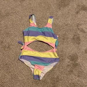 Little girls stripe swimsuit with cut out.
